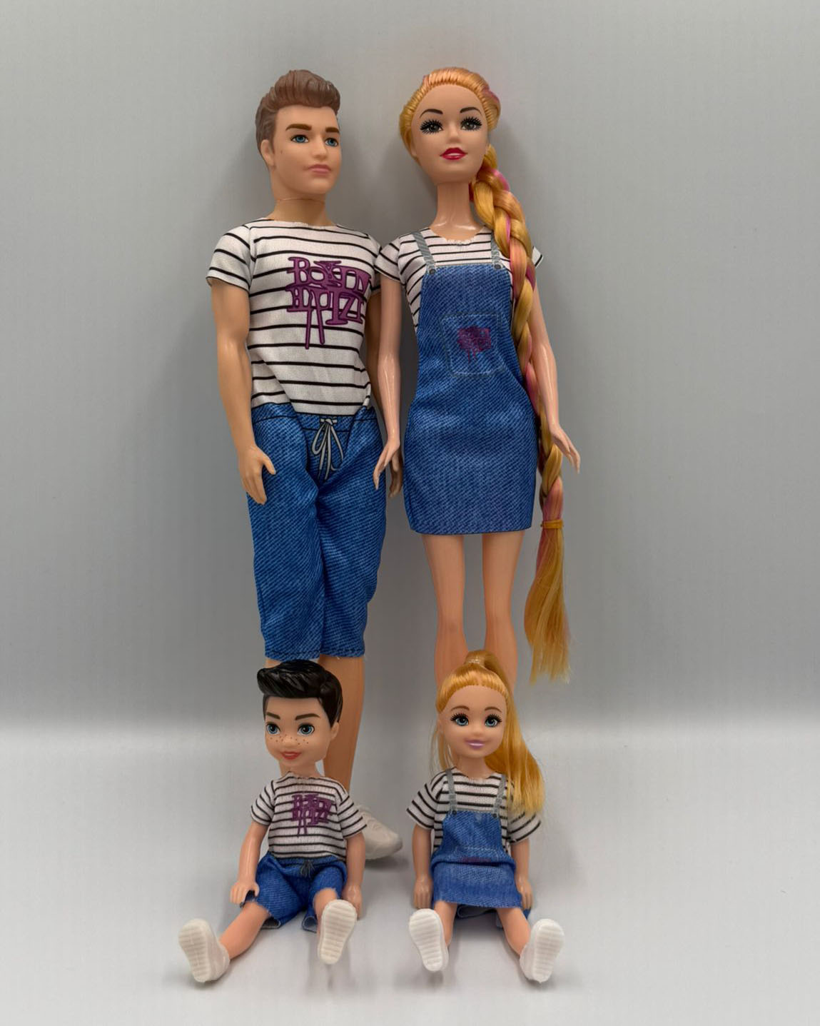 Family Doll Set featuring four dolls representing parents and children